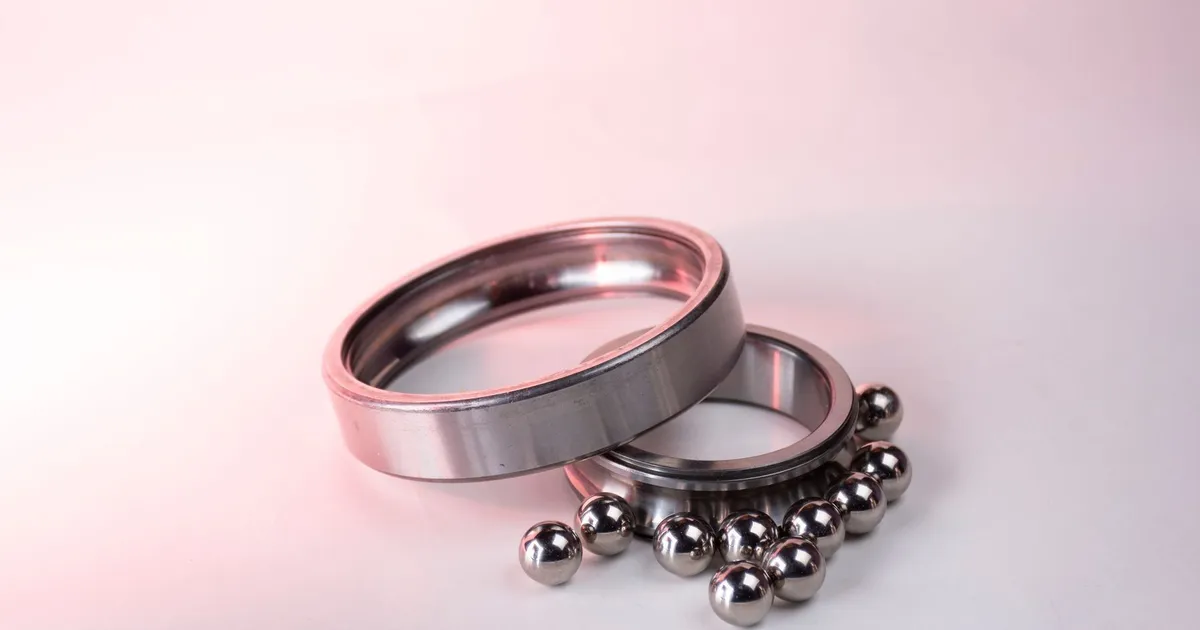 A steel bearing ring and steel balls, the kind of part made by 52100 hard turning